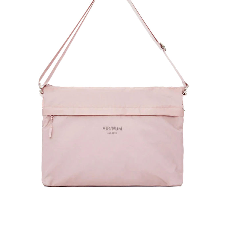 Pink messenger bag top